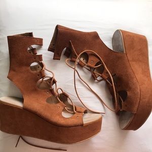 Gladiator lace up sandals on a platform